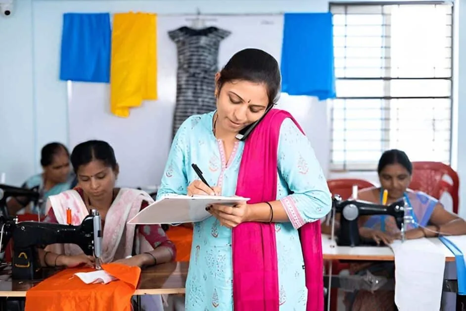 Indian women entrepreneurs learning tailoring through a small business programme